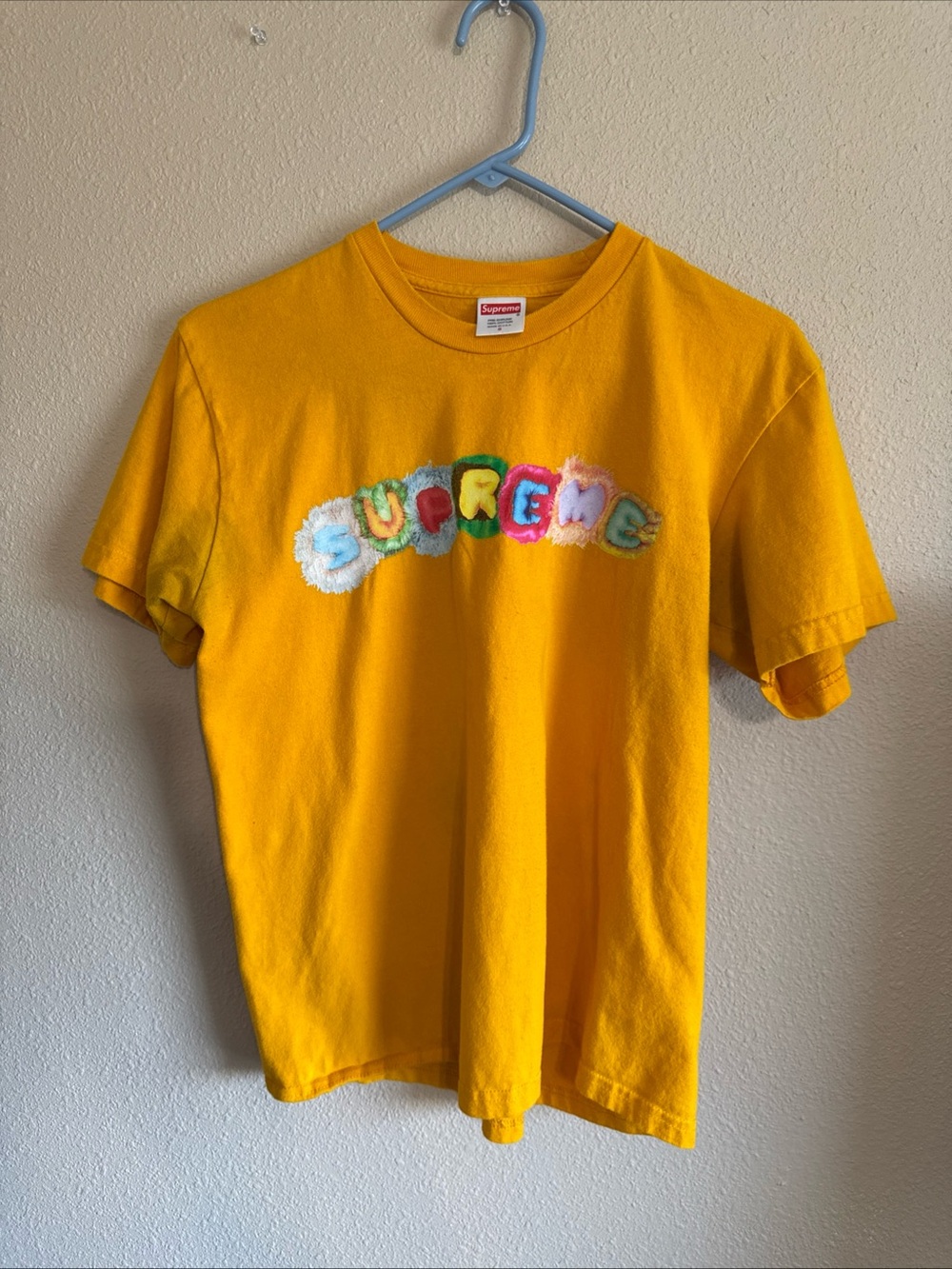 Supreme Yellow Short Sleeve Tee with Multicolor Fuzzy Lettering